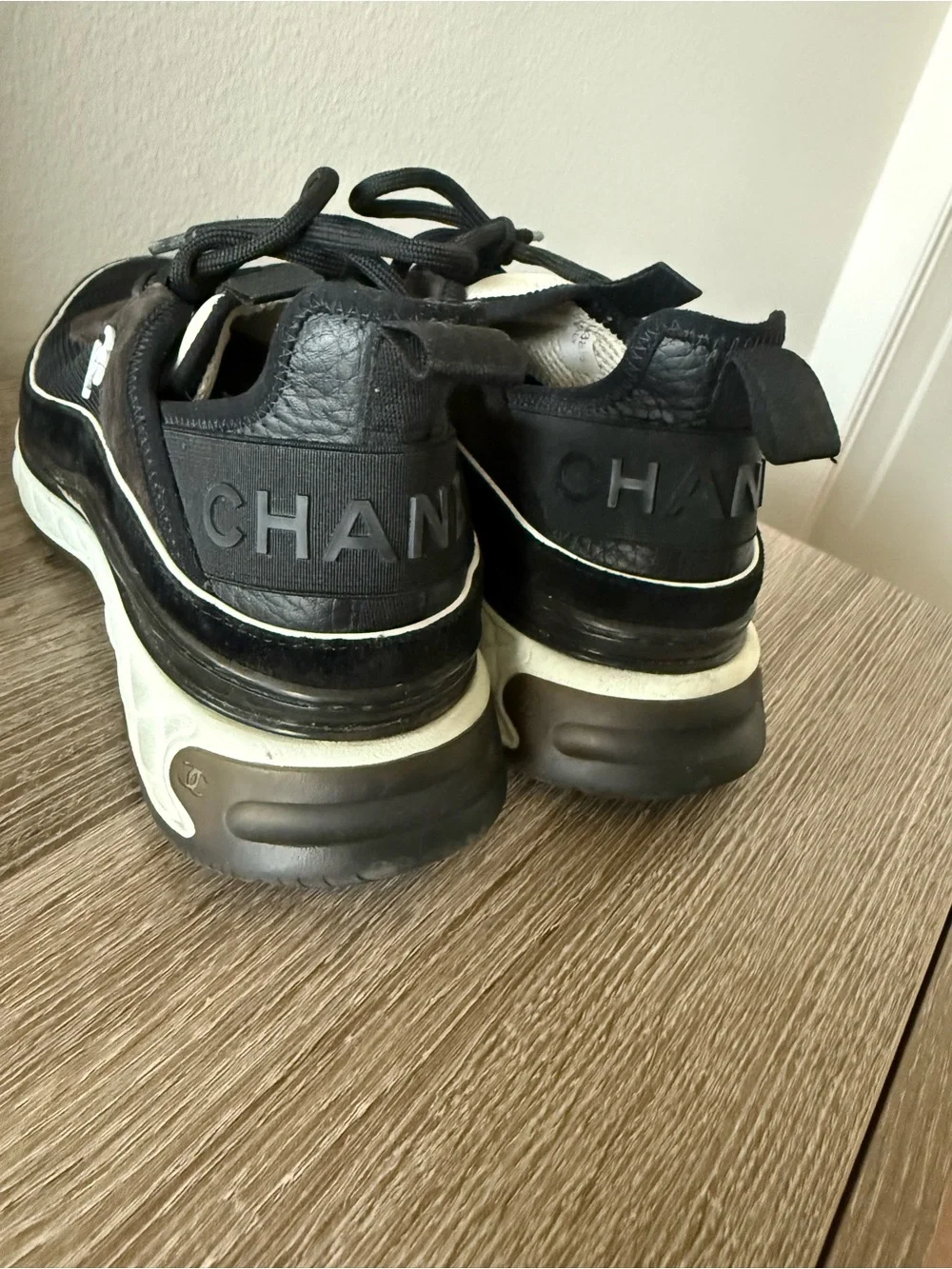 CHANEL Black and White Interlocking CC Runner Sneakers
